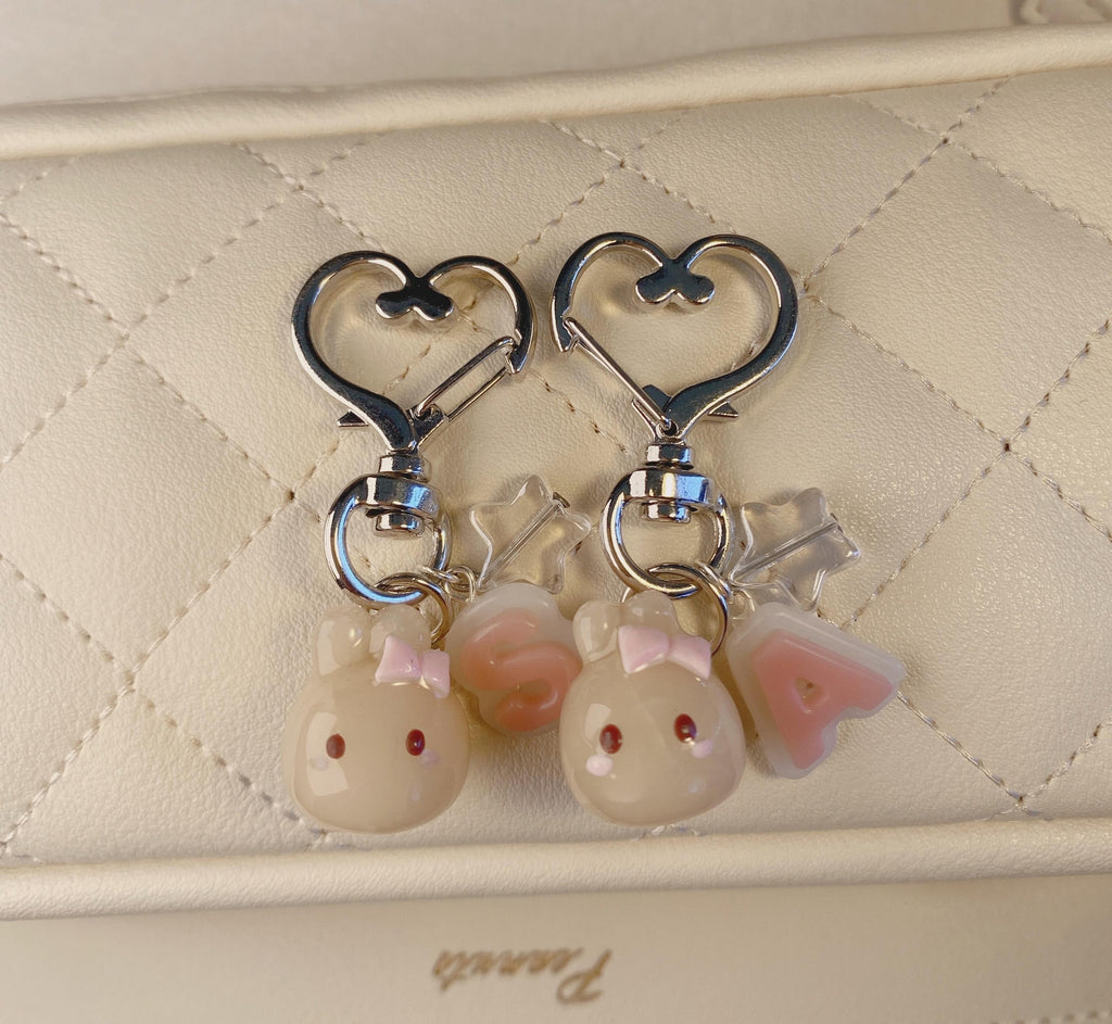 Pink themed polymer clay bunny keychain, with customizable letter