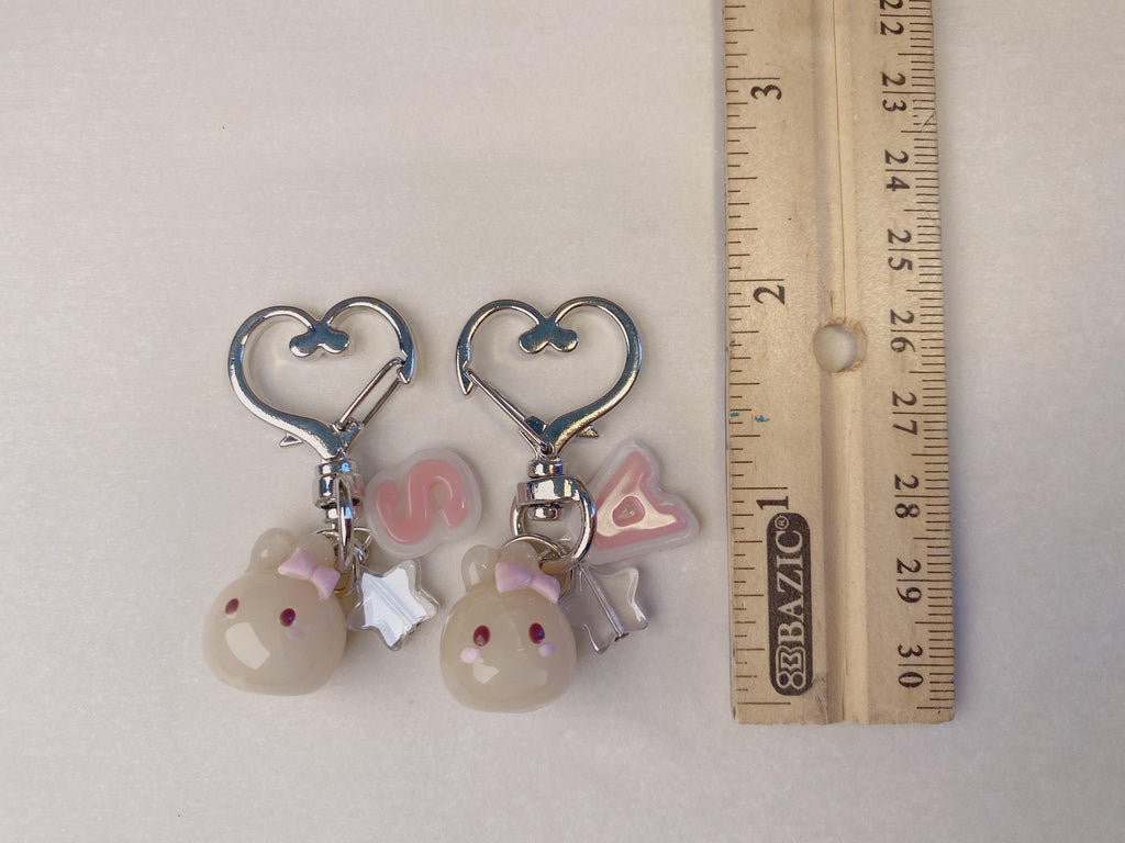 Pink themed polymer clay bunny keychain, with customizable letter