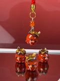 Wapo the Takoyaki, a clay keychain