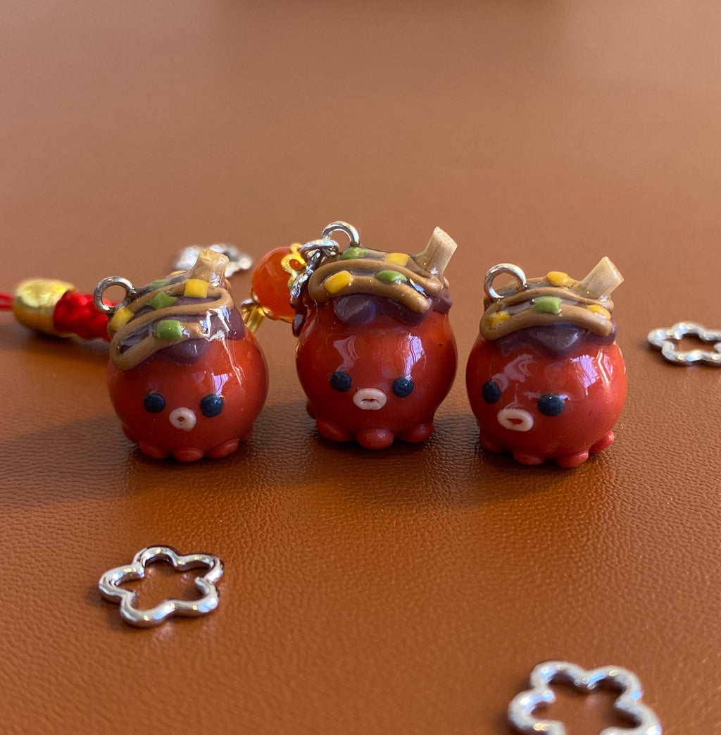 Wapo the Takoyaki, a clay keychain