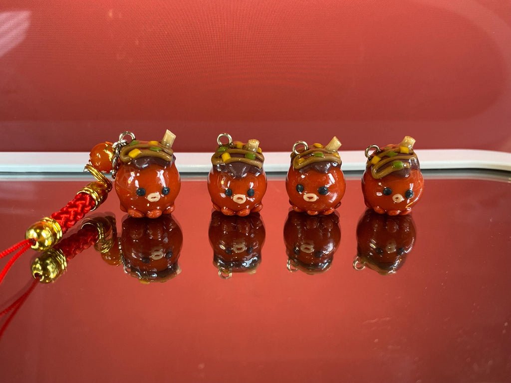 Wapo the Takoyaki, a clay keychain